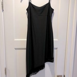 Asymmetrical black cocktail dress with fringe detail